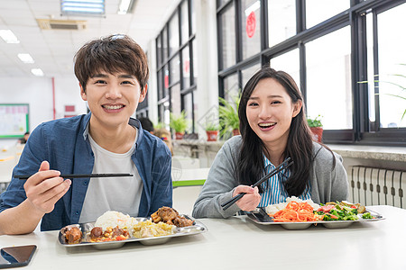 美食美味大学生在食堂里用餐高清图片