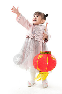 手提灯笼拿着亚洲人一个小女孩手提红色灯笼庆祝新年背景