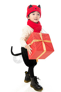 拿礼物的孩子愿望传统庆典包装盒小男孩过年穿新衣服拿礼物背景