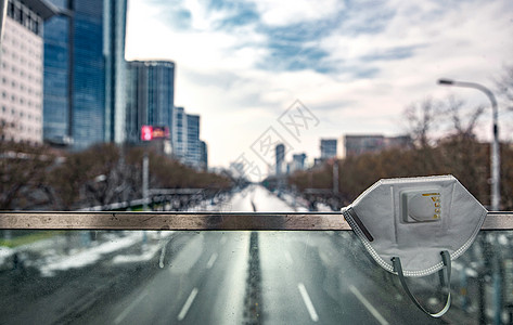 景观道路城市建筑背景下的口罩背景