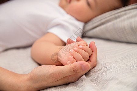 小朋友握手女婴妈妈和宝宝的手背景