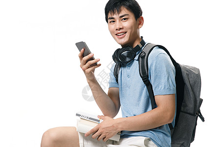 男人手机青年人一个年轻的大学男生图片