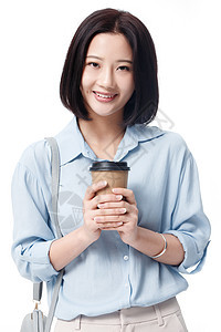 青年女白领手拿咖啡杯图片