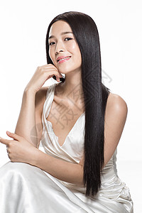 发背景美容黑发有着柔顺的长发的美女背景