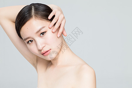 漂亮的人东方人自我完善青年女人妆面肖像图片