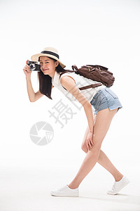 轻装旅行休闲装快乐青年女人旅行图片素材