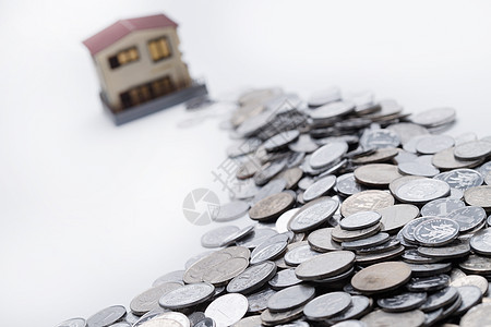 硬币投资彩色图片硬币和房屋模型图片
