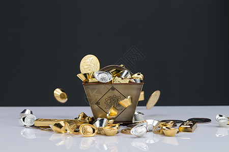 金元宝金币金元宝影棚拍摄无人金子和银子背景