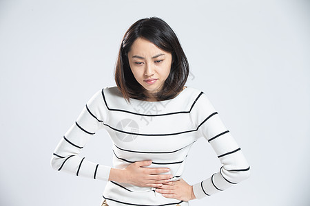 捂着肚子的女孩亚洲人青年人水平构图青年女人肚子疼背景