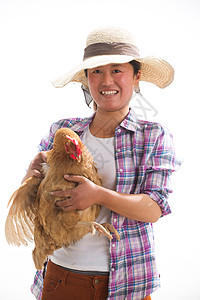 新农村民草帽中年女人拿着一只鸡背景