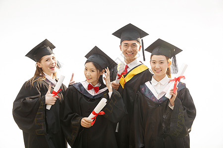 微笑美女毕业大学生穿着学士服庆祝毕业背景