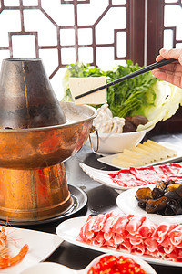 火锅肉卷团圆饭筷子饮食涮羊肉背景