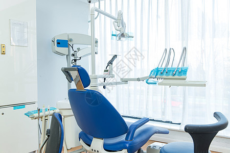 保健医疗用品明亮牙科诊疗室里的医疗设备背景图片