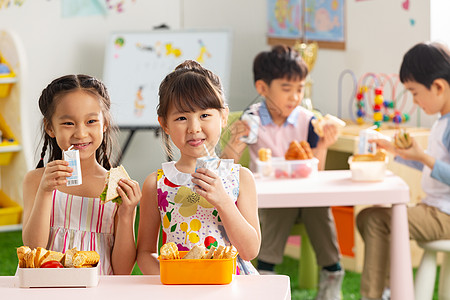 小学生吃饭幼儿园小朋友用餐背景
