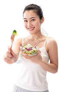 亚洲养生幸福青年女人吃沙拉图片