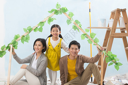 油漆涂料人女人夫妇快乐家庭装修房子背景