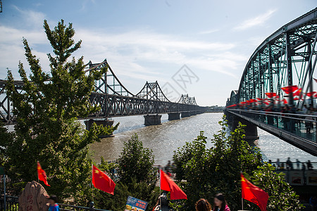 地理风景日光红旗辽宁省丹东中朝友谊桥背景