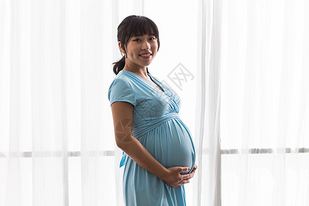孕育东亚20多岁幸福的孕妇图片