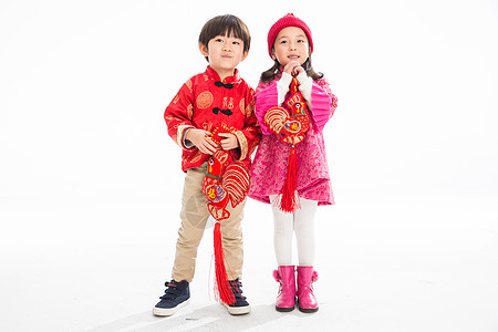 亚洲联系影棚拍摄可爱的孩子庆祝新年图片