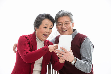 60多岁联系拿着老年夫妇过新年高清图片