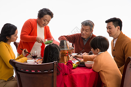 火锅肉卷喜庆饮料女人幸福家庭过年吃团圆饭背景
