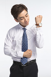 东亚亚洲人男商人戴着腕表的商务青年男人图片