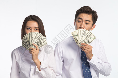 金融美国水平构图办公室职员20多岁商务青年男女拿着美元背景