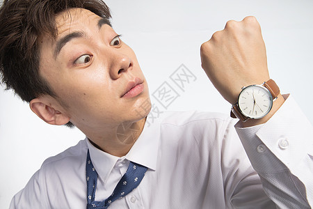 筋疲力尽压力25岁到29岁戴着腕表的商务青年男人图片