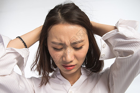 亚洲挫败青年人面部表情痛苦的青年女人图片