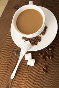 手绘汤匙和方糖浪漫咖啡与方糖背景