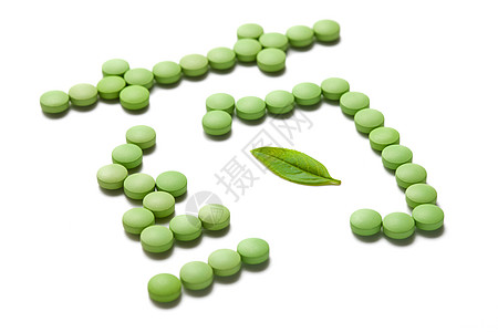 绿色药片组成的药字图片