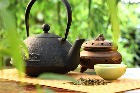 佛与茶香炉休闲竹子茶具背景