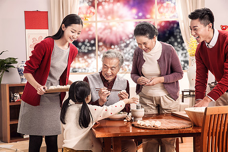 春节团圆20多岁节日兴奋快乐家庭过新年包饺子背景