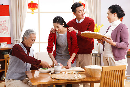 冬至快乐团圆饭仅成年人饮食快乐家庭过新年包饺子背景