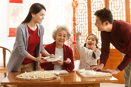 儿子温馨快乐面食幸福家庭过年包饺子背景