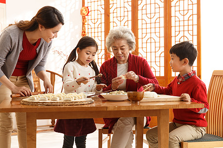 元旦快乐素材两个孩子的家庭女人彩色图片幸福家庭过年包饺子背景