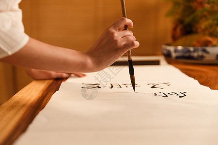 中国元素女人练习书法特写背景