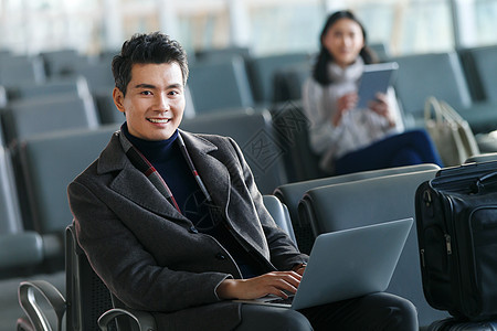 成功人士空运大楼候机室商务男女在候机大厅图片