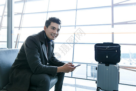 中年人亚洲表现积极商务男士在机场图片