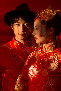 红色刺绣中式古典婚礼的新人背景