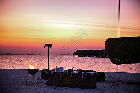 海景夕阳椅子布置彩色图片马尔代夫海景背景