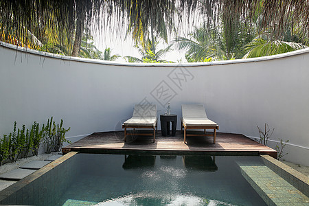 风景旅游胜地躺椅马尔代夫游泳池图片