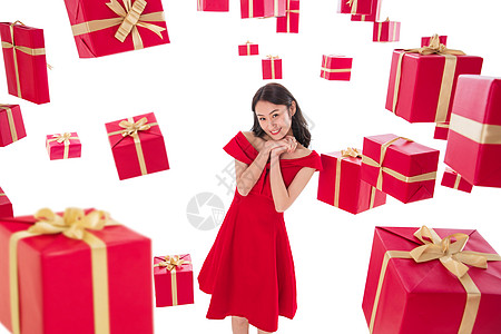 圣诞礼物青年人年轻人漂亮的年轻女人与礼物高清图片