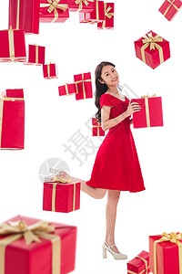 传统节日红色青年人漂亮的青年女人拿着礼物高清图片