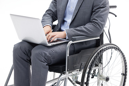 商务男性坐轮椅办公特写图片素材