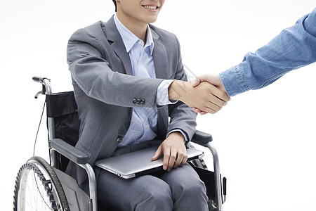 坐轮椅的商务人士洽谈合作图片