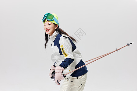 年轻美女滑雪动作图片