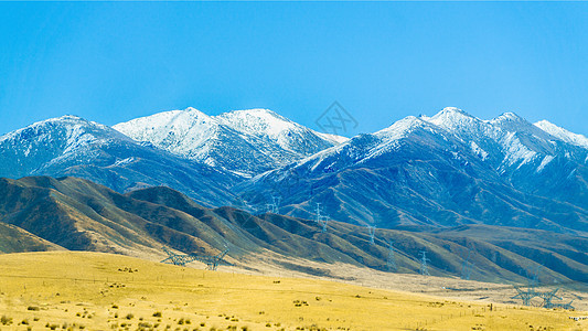 冬日日月雪山自然风光图片