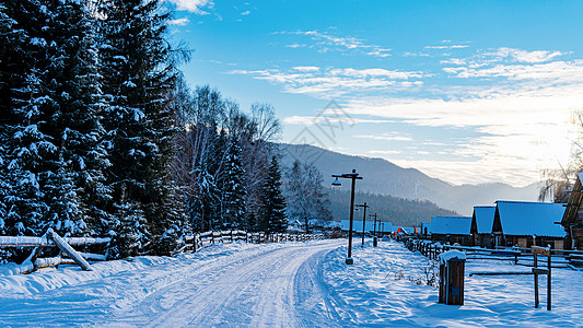 冬日雪景新疆禾木景区古村落雪景背景