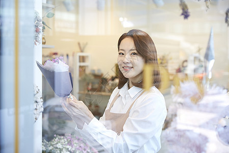 分庭律师非常小一束花花店年轻女子韩国人图片